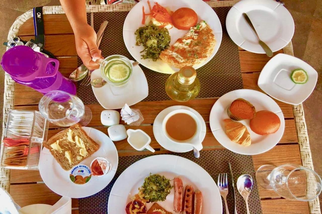 ザ コンコルド ホテル ＆ スイーツ ナイロビ エクステリア 写真 A typical breakfast at the hotel